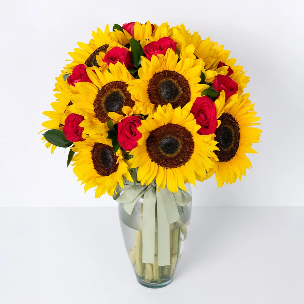 12 Red roses with sunflowers in a vase 11751