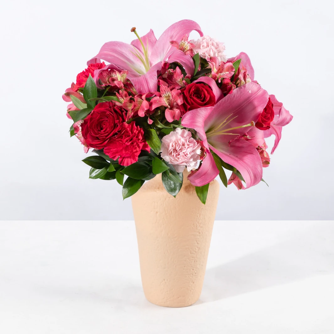 Arreglo de Stargazers y Alstromerias en Jarrón Beige 18139
