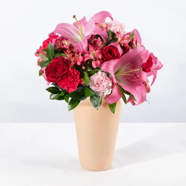 Arreglo de Stargazers y Alstromerias en Jarrón Beige 18139