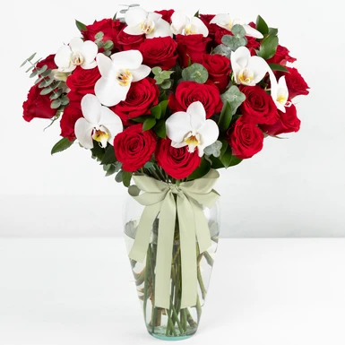Arreglo de Rosas Rojas y Orquídea 20173