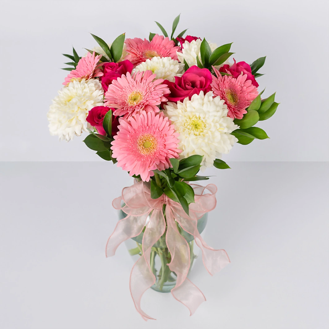 Arreglo de Gerberas con Rosas Fucsia 21300
