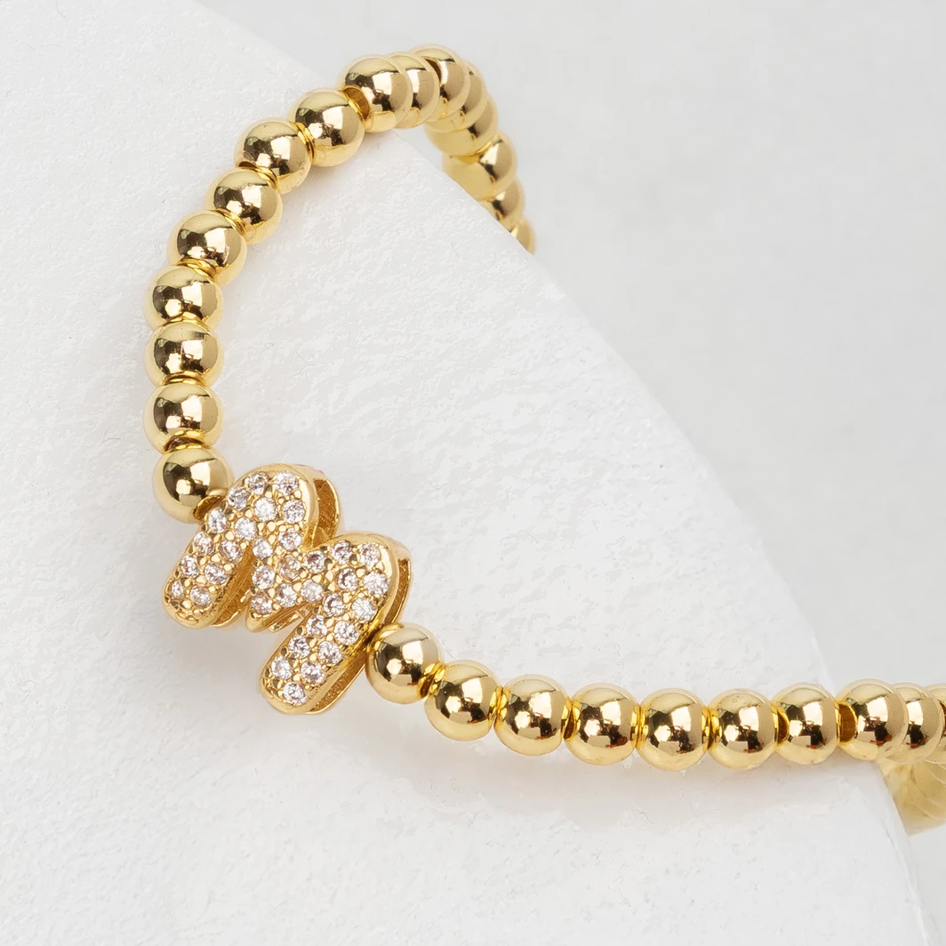 Pulsera Dorada Con Inicial M Mini Bubble Zirconia Lorenza 25070