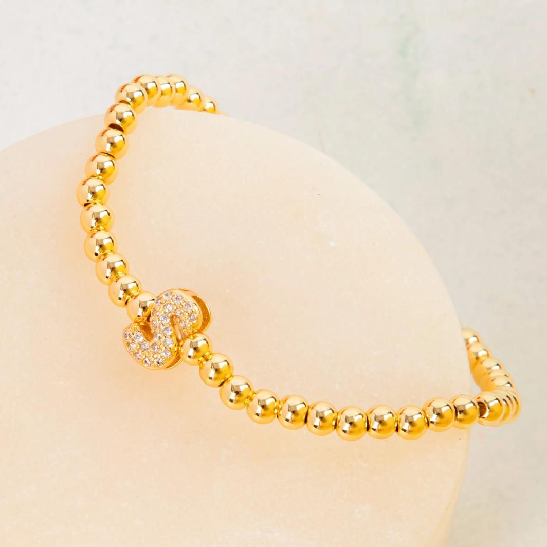 Pulsera Dorada Con Inicial S Mini Bubble Zirconia Lorenza 25073