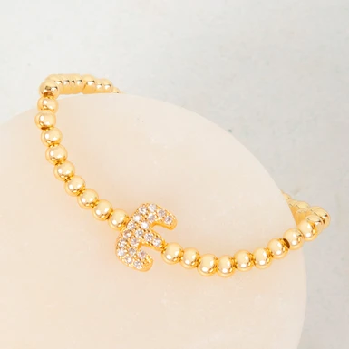 Pulsera Dorada Con Inicial E Mini Bubble Zirconia Lorenza 25074