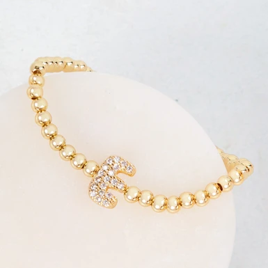 Pulsera Dorada Con Inicial E Mini Bubble Zirconia Lorenza 25074