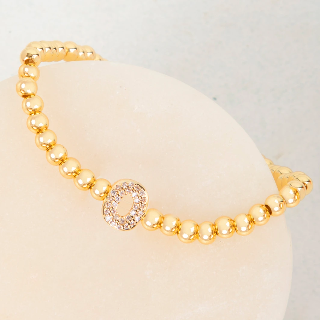 Pulsera Dorada Con Inicial O Mini Bubble Zirconia Lorenza 25076