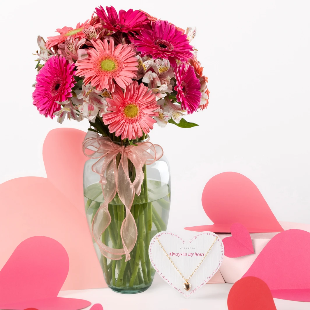 Arrangement of Pink Gerberas and Golden Mini Heart Necklace by Malandra 26265